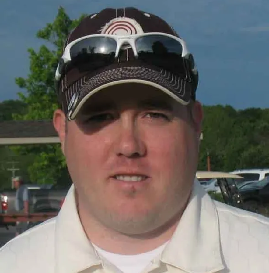 Chuck Young hole-in-one club photo